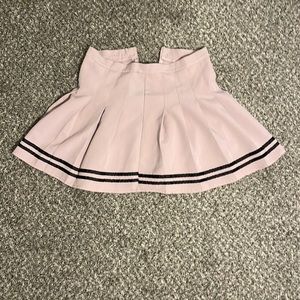 Pink pleated mini skirt